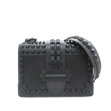 prada across the body bag|Prada studded crossbody bag.